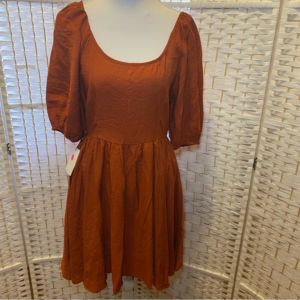 Mia Joy Rust Puff Sleeve Scoop Neck Dress. Made from 80% rayon and 20% polyamide